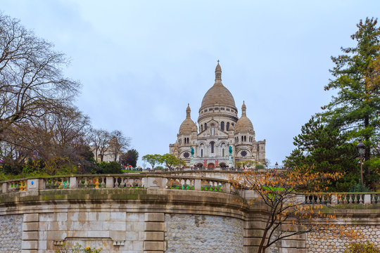 PARIS, FRANCE - View of Basilica Sacre Coeur on Montmartre, Paris, France - Roman Catholic Church and minor basilica, dedicated to Sacred Heart of Jesus.