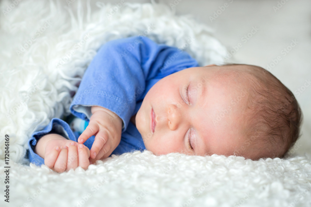 Sticker Beautiful newborn baby boy, sleeping