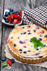 Cheesecake  with wild forest berries. Summer dessert