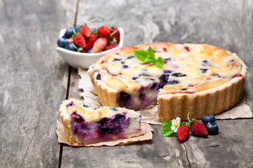 Cheesecake  with wild forest berries. Summer dessert