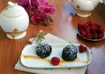 chocolate cakes and fresh raspberries