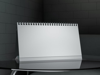 Empty desk calendar on table. Mockup design concept. 3D rendering