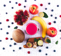 Pink smoothie with fruits and berries.
