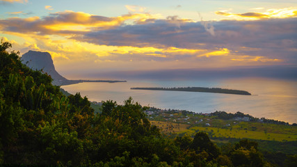 View from Piton de la Petite Riviere Noire, highest peak of Mauritius. Panorama at sunset.Le Morn Brabant on background.
