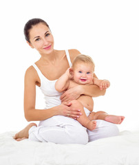 Mother and baby playing and smiling. Happy family. Isolated,