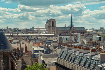 French roofs. Beautiful roofs view in Paris City downtown with s