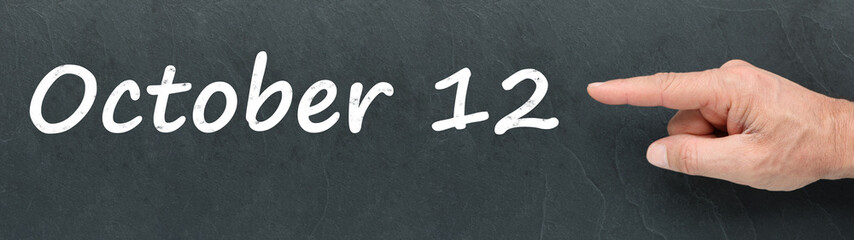 Obraz premium October 12 on a blackboard