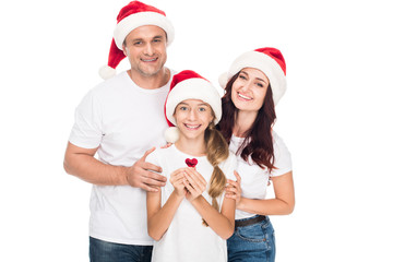 Happy family in Santa hats