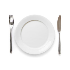 Empty plate with knife and fork isolated on white