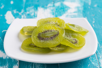 Dried Preserved Kiwi Fruit wooden background