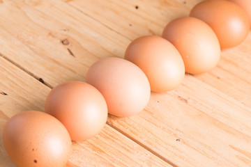 Organic eggs on wood. Fresh eggs.