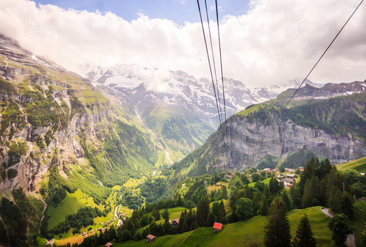 Stunning Lauterbrunnen valley rural view, bird eye view from cable car from Stechelberg to Murren Station, Lauterbrunnen, Bernese Oberland, Switzerland, Europe.