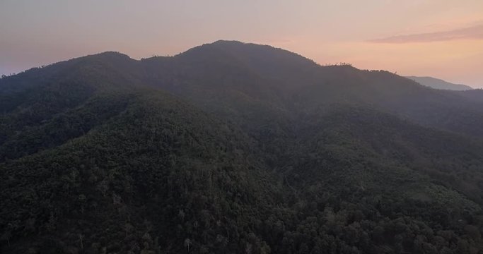 Sunset Over Mountains And Mekong River At Pakbeng, Laos, High Aerial Pan Shot
