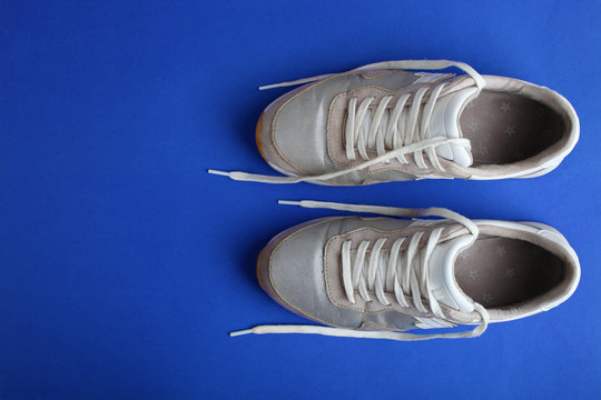 One Pair Of Silver Sneakers