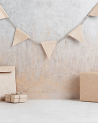 Background with garland of small paper flags and gift boxes