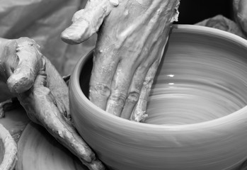Process of making clay bowl on pottery wheel © BSANI