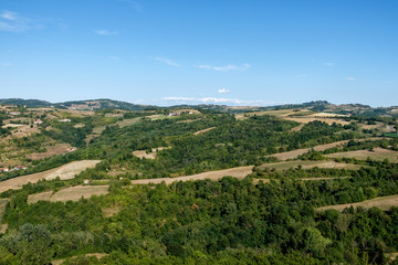 Fototapeta na wymiar View of Langhe hills from the top of the medieval tower of Murazzano, Piedmont, Italy.Piedmont, Italy.