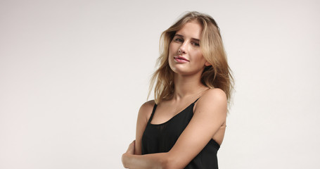 Fototapeta premium Beautiful blonde in black camisole
