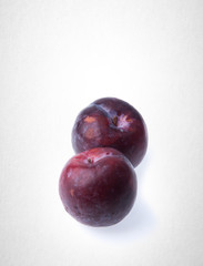 Plum or Sweet Ripe Plum fruit on a background.