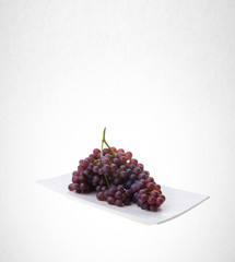 Grapes or red grapes on a background.