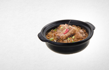 Claypot pork rice or pork rice on a background.