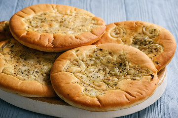 Traditional polish bread with onion known as cebularz. - obrazy, fototapety, plakaty