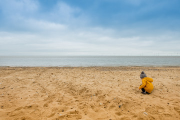 Fototapeta na wymiar Child on English Beach