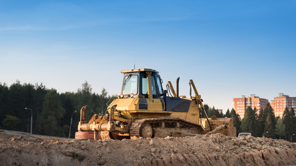 Yellow Construction bulldozer at Work © Mak