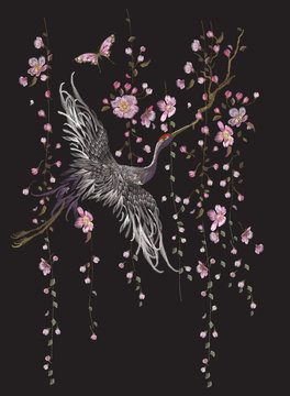 Embroidery oriental floral pattern with crane. Vector embroidered blank with bird for clothing design.