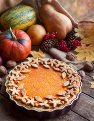 Obraz na płótnie Canvas Festive homemade Pumpkin pie autumn dessert pastry made for Thanksgiving, Close up. Decorated with a sand dough
