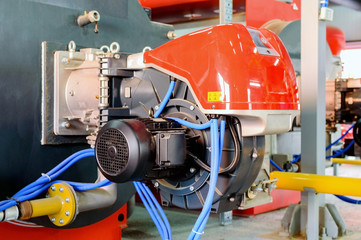 Industrial boiler equipment with blowing gas burner