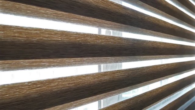 Opening window zebra blind curtain.