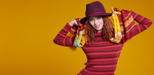 young redhead woman in autumn color isolated on fall  background