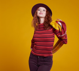 young redhead woman in autumn color isolated on fall  background