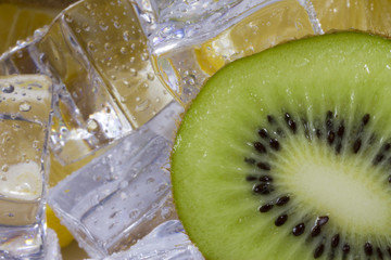 Naklejka na ściany i meble Kiwi fruit with ice