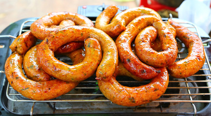 Thai Lanna Sausage on Grill.