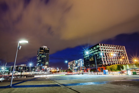 A Beautiful View Of Melbourne City Around Dockland With A Cloudy Sky And Twilight In Melbourne Australia.