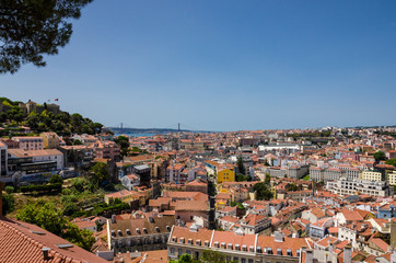 Fototapeta premium View on Lisbon city, Castle S. Jorge and bridge 25 de Abril, Portugal