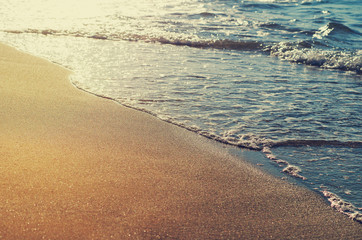 Serenity sand beach with waves. Sunny sea shore