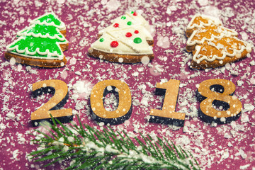 New Year card Inscription Happy new year 2018 on the background of snow and decor