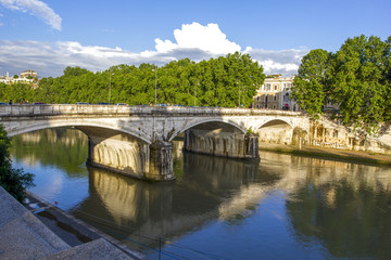 Fototapeta na wymiar View of Rome and Tiber river. Beautiful European River Bridge. Italy