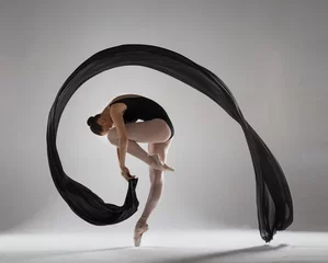 Foto op Plexiglas Graceful ballerina with a black veil © alexlukin