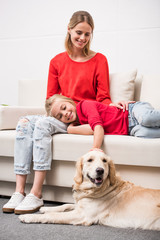 mother and daughter with dog