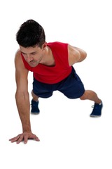 Full length of sports player exercising