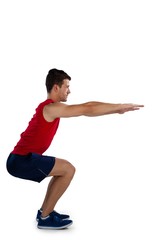 Side view of sports player exercising with arms outstretched