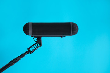  Sound recorder microphone, boom mic on blue background - 172110354