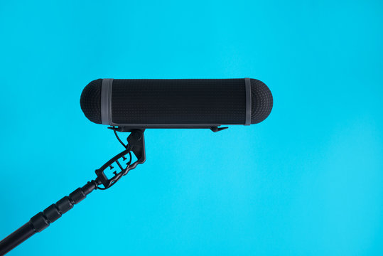  Sound recorder microphone, boom mic on blue background