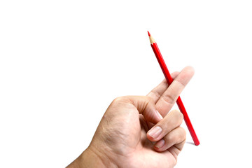a hand holding  color pencil on white background isolated