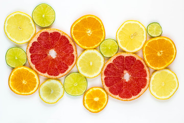 Fototapeta na wymiar top view of slices of citrus fruits