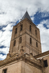 Fototapeta na wymiar Campanario de la Iglesia San Nicolás de Bari en Madrigal de las Altas Torres, Ávila, España